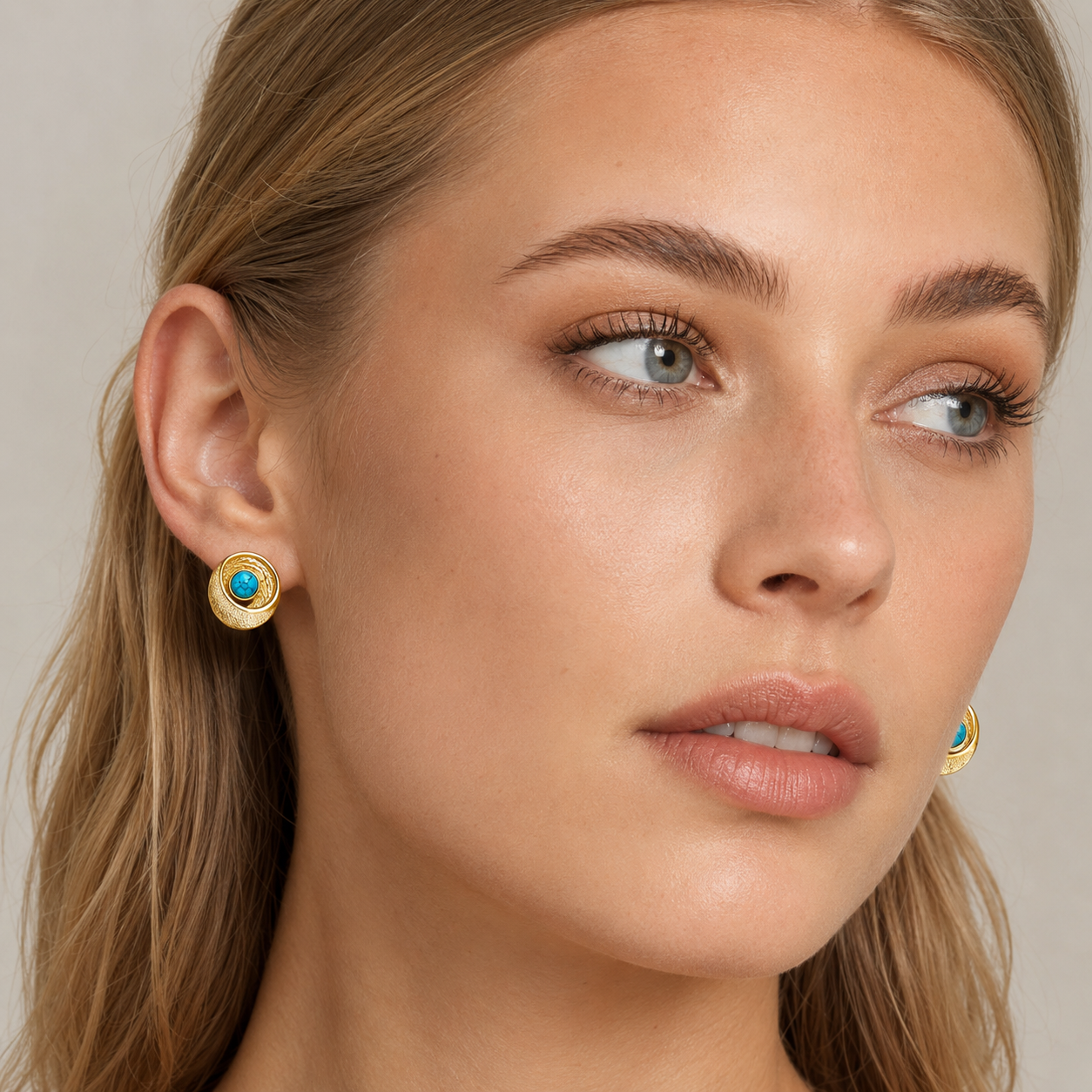 Woman Wearing Vintage Round Turquoise Stud Earrings with Gold Plated Jewelry Style